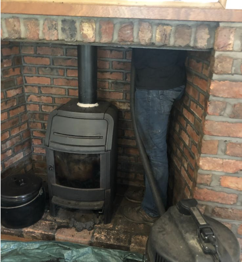 Wood burning stove chimney sweep